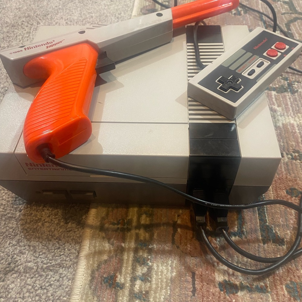 Nintendo Console with Gray and Orange Accessories